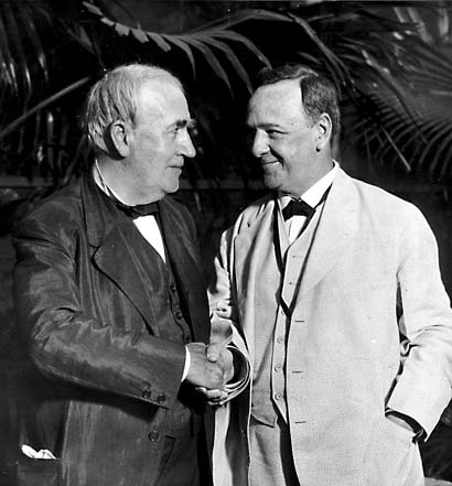 Edison shakes hands with Secretary of the Navy Josephus Daniels